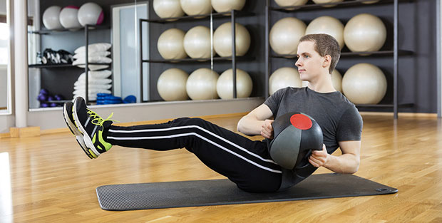 Teenager doing core exercises