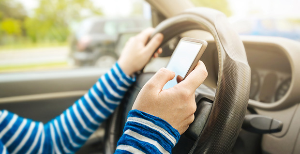 Teenager texting while driving