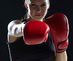 girl wearing boxing gloves