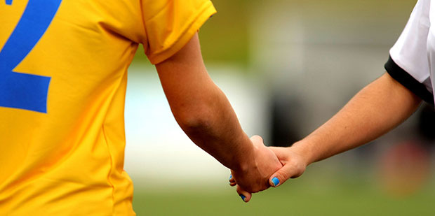 Two players shaking hands