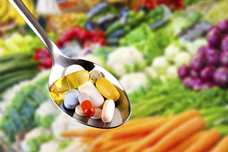 vitamen supplements and assorted vegetables