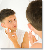 boy looking in mirror