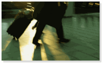 person walking with luggage