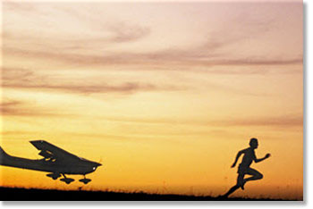 airplane and man running