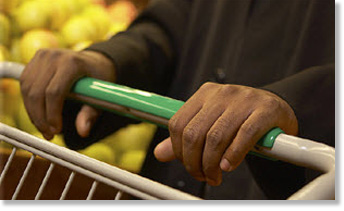 man pushing cart