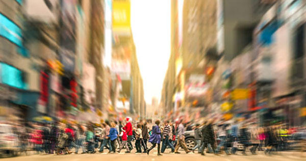 blurry image of a crowded city street