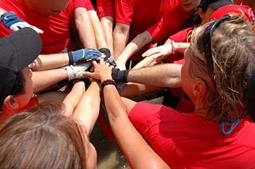 team of students in a huddle