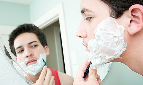 Adolescent Male Shaving