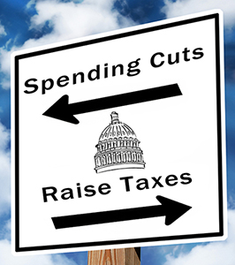 Sign with words "Spending Cuts" and "Raising Taxes"