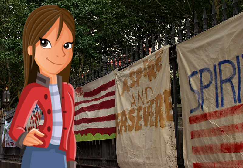 Martina in front of a gate with flags supporting victims of 9/11