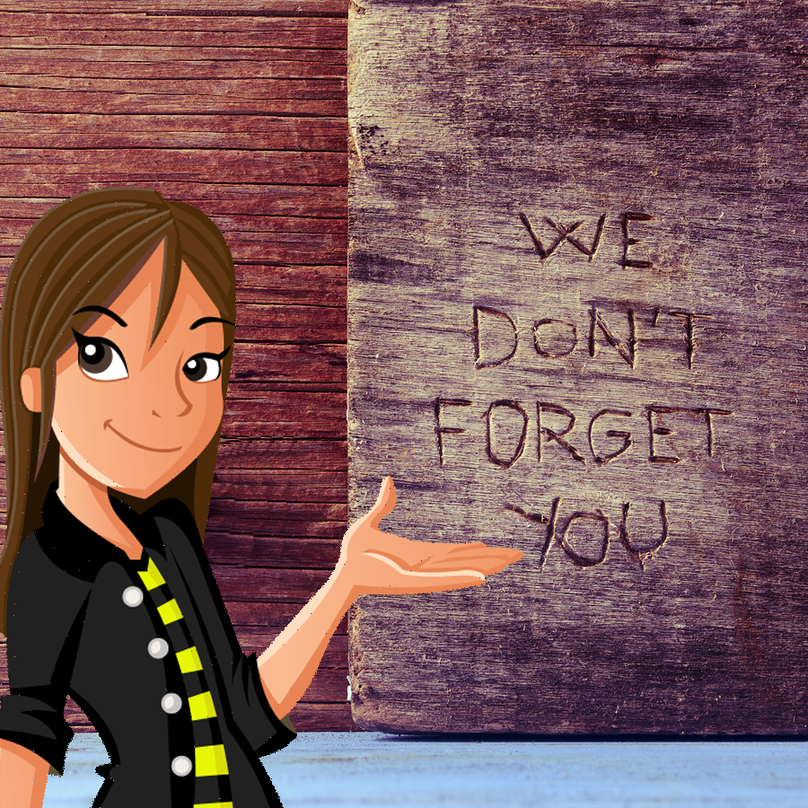 Martina standing in front of a wall that has "we don't forget you" carved into it