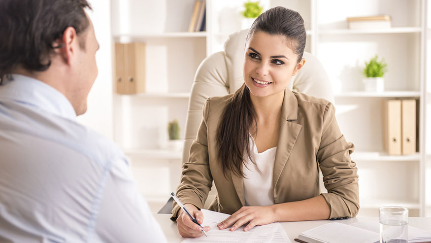 young woman giving an interview to a man