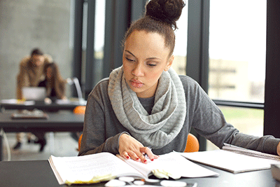 female student doing research