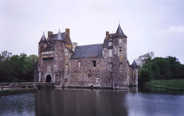 a manor house with a moat