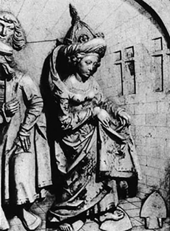 a relief image showing the wife of a Holy Roman Emperor completing an ordeal