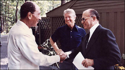 Image of Anwar Sadat, Jimmy Carter and Menachem Begin at Camp David in 1978.