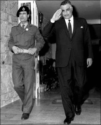 Image of young Muammar al-Gaddafi with Nasser, 1969.